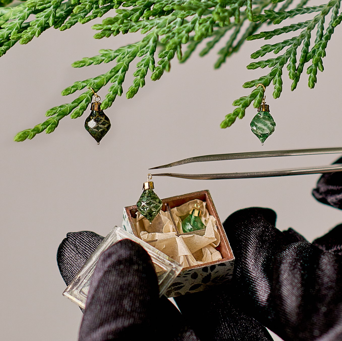 Christmas ornaments set in the box. Seafoam and crocodile green with sparkling effect 4 ornaments.