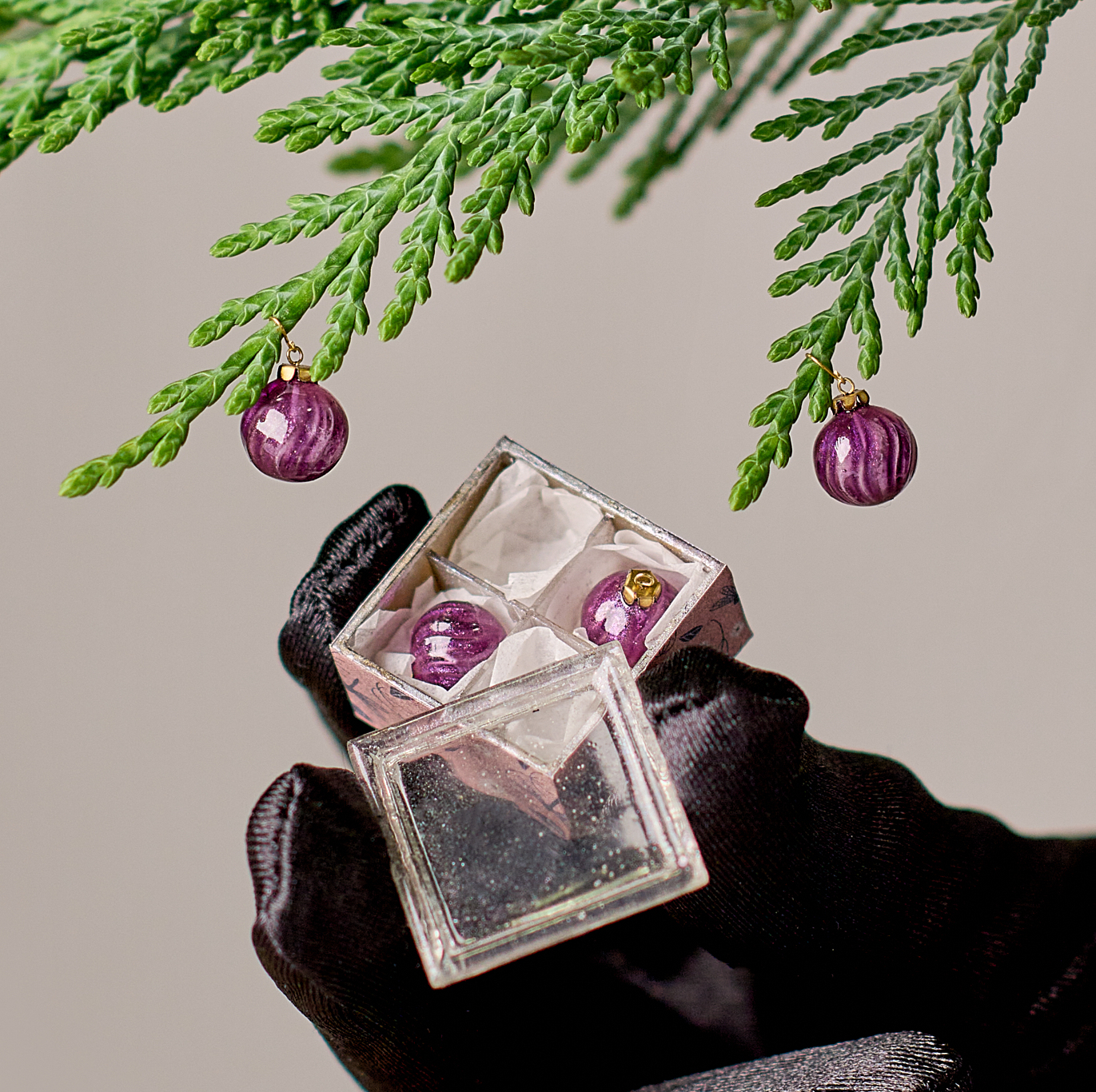 Christmas ornaments set in the box. Violet with purple sparkling effect 4 ornaments.