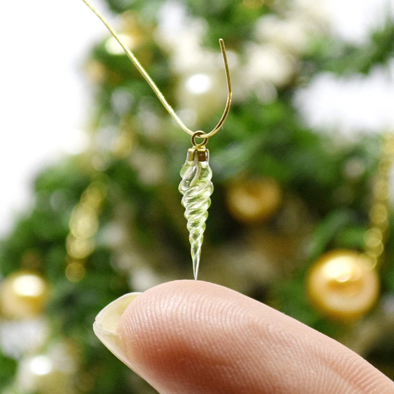 Xmas ornament. Painted. Icicle twisted green.